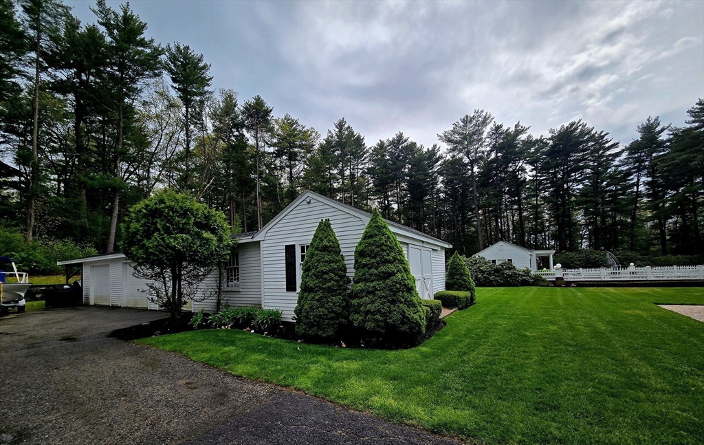 28 Pineswamp Road Ipswich, MA 01938 - Photo 8 of 42 a view of a house with backyard and garden