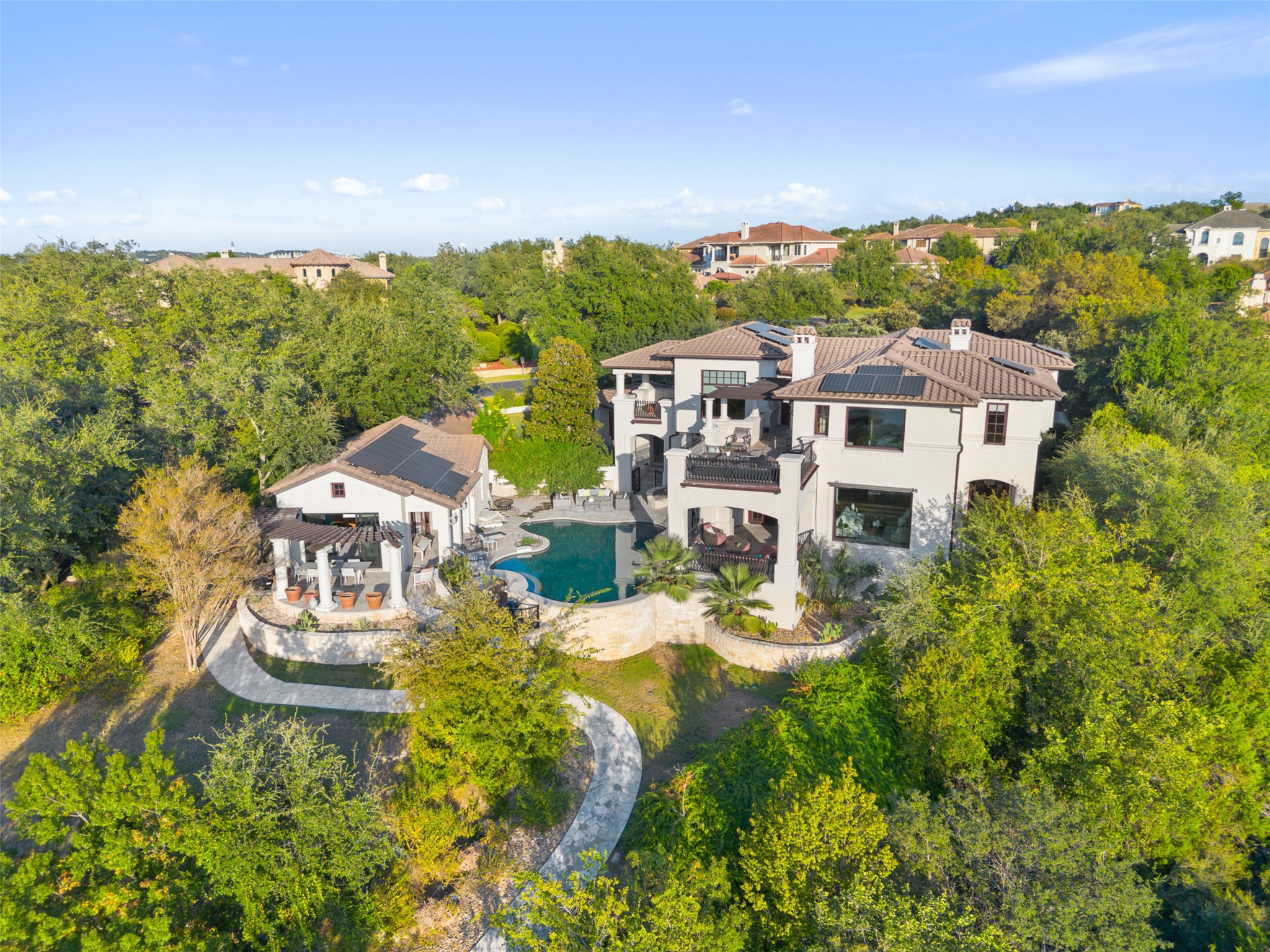 203 Bella Riva Drive Austin, TX 78734 - Photo 1 of 40 Panoramic Lake Travis views from this waterfront estate on 2+ acres in Costa Bella