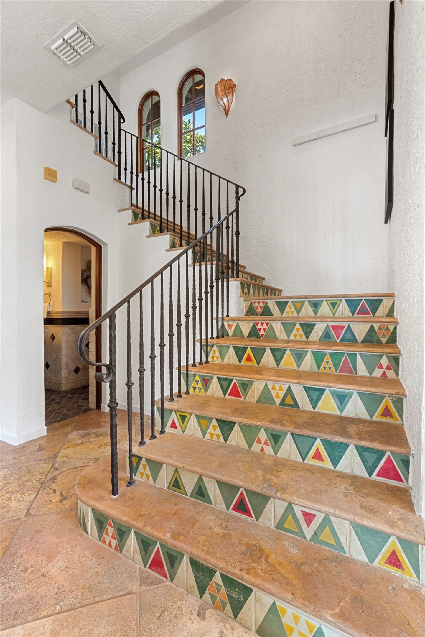 203 Bella Riva Drive Austin, TX 78734 - Photo 13 of 40 Staircase showcasing touches of an Italian villa