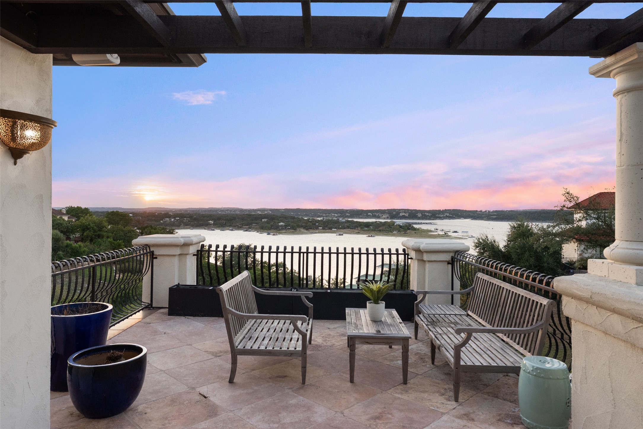 203 Bella Riva Drive Austin, TX 78734 - Photo 17 of 40 a view of a balcony with chair