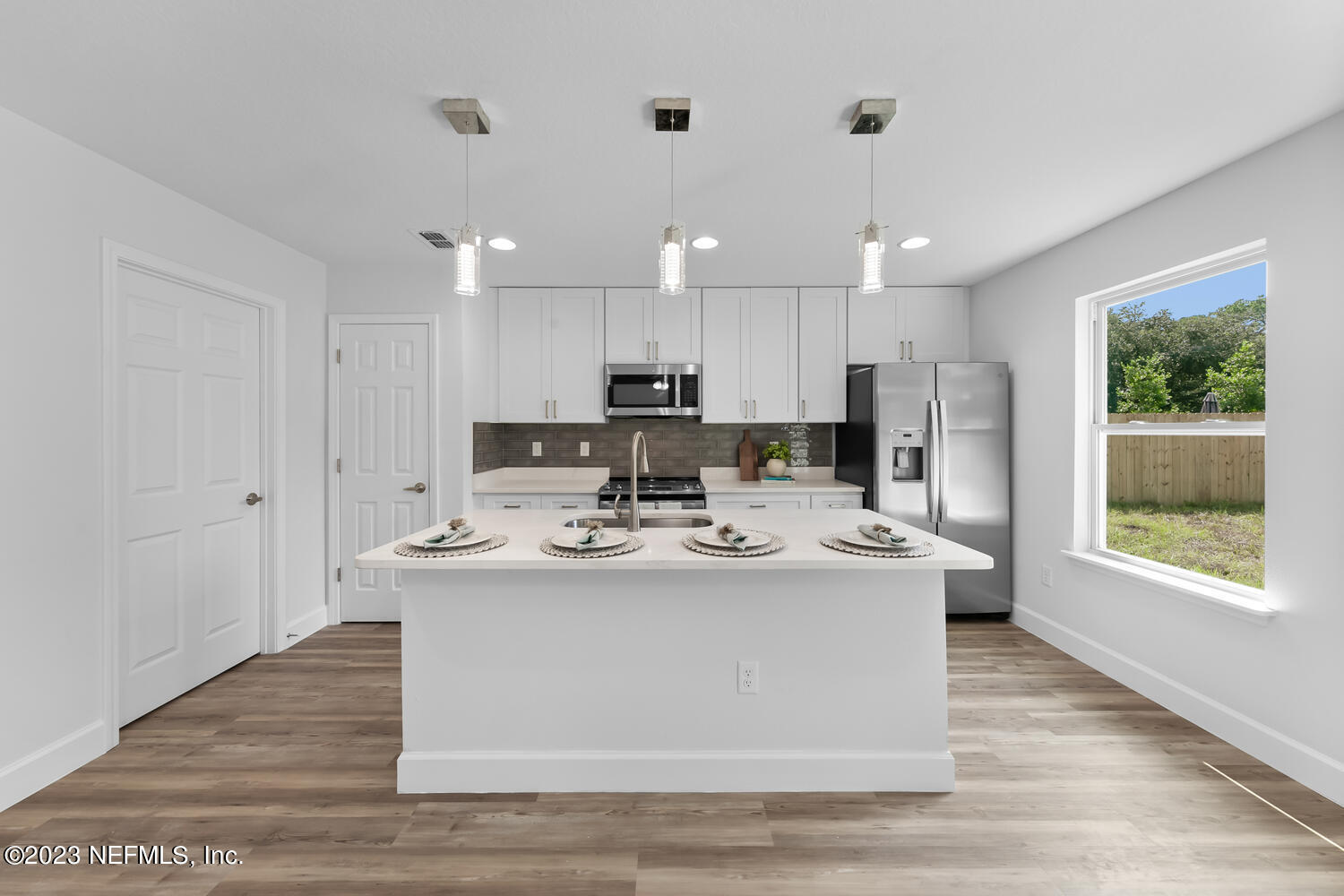 3748 Foxcroft Road Jacksonville, FL 32257 - Photo 13 of 33 a view of kitchen with stainless steel appliances granite countertop a sink a stove and a refrigerator