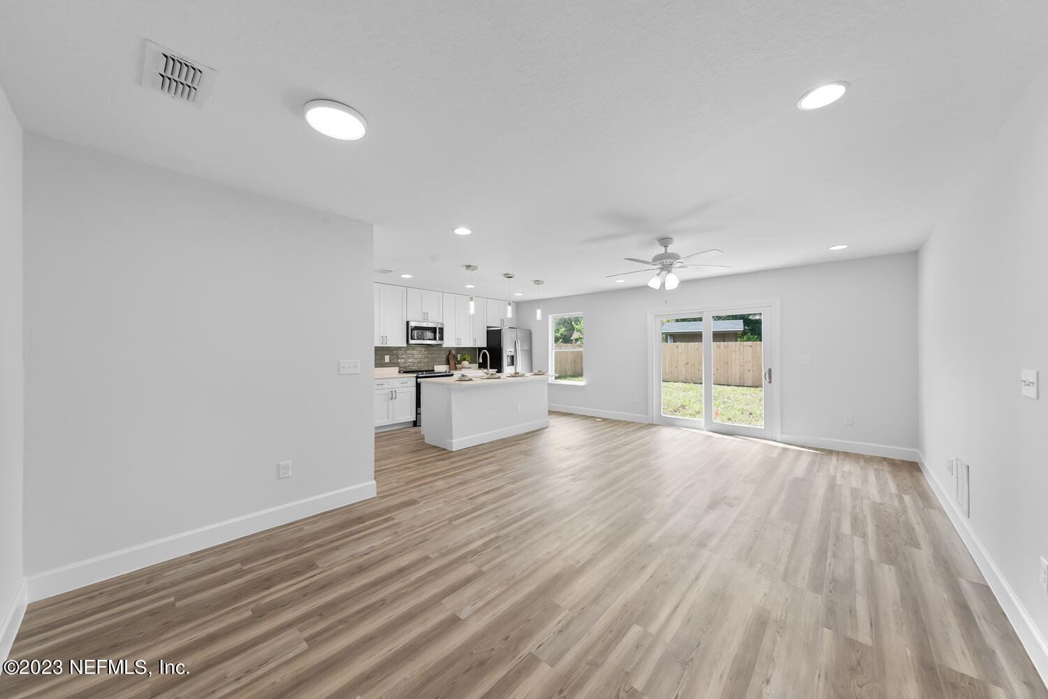 3748 Foxcroft Road Jacksonville, FL 32257 - Photo 21 of 33 a view of kitchen and hall with wooden floor
