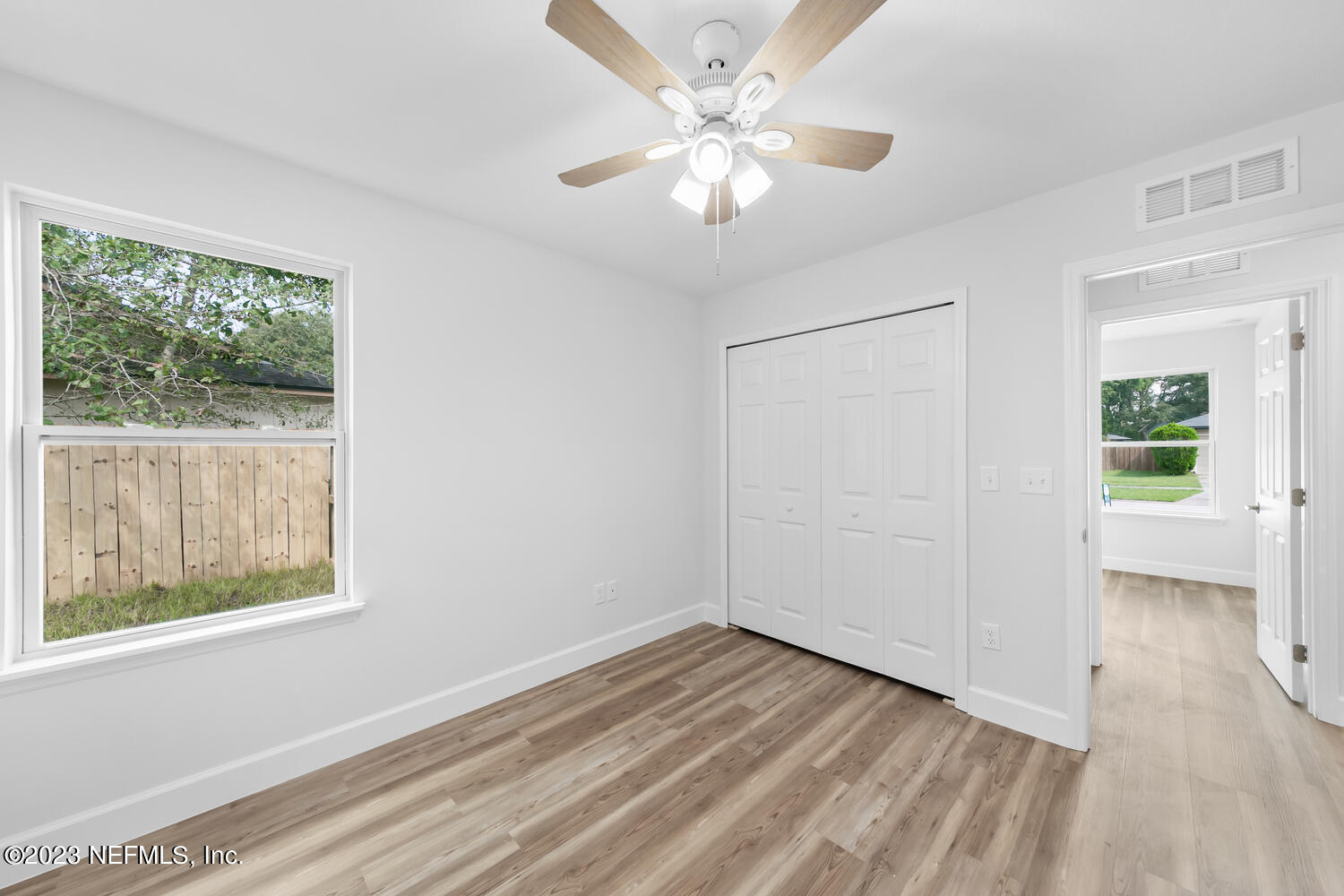 3748 Foxcroft Road Jacksonville, FL 32257 - Photo 26 of 33 a view of an empty room with a window