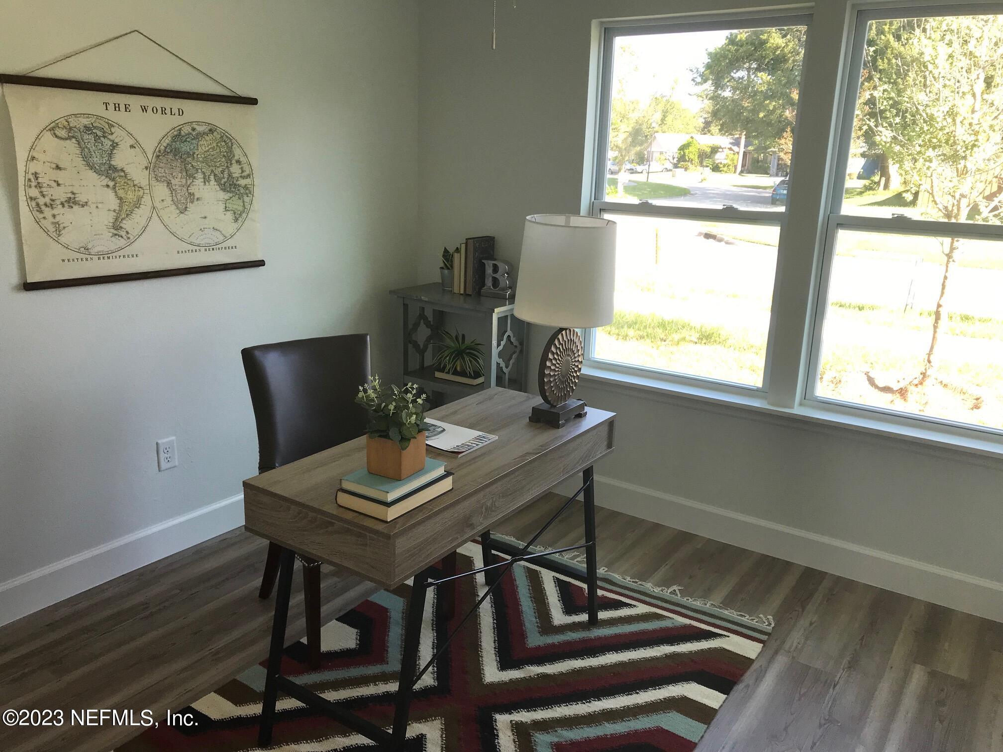 3748 Foxcroft Road Jacksonville, FL 32257 - Photo 27 of 33 a view of a workspace with furniture and a window