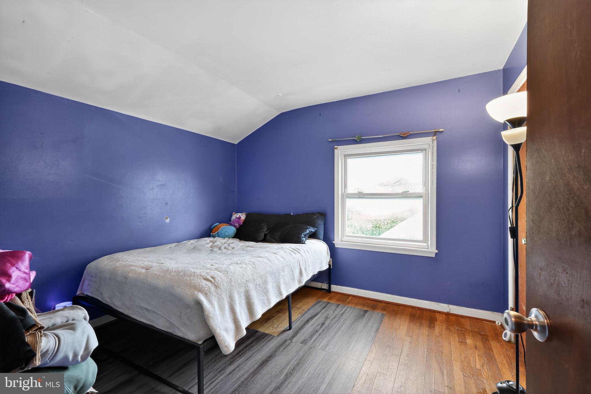 2924 Gracefield Road Silver Spring, MD 20904 - Photo 11 of 29 a bedroom with a bed and a window