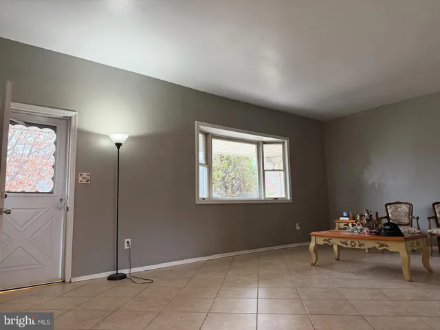 a bedroom with a bed and a closet