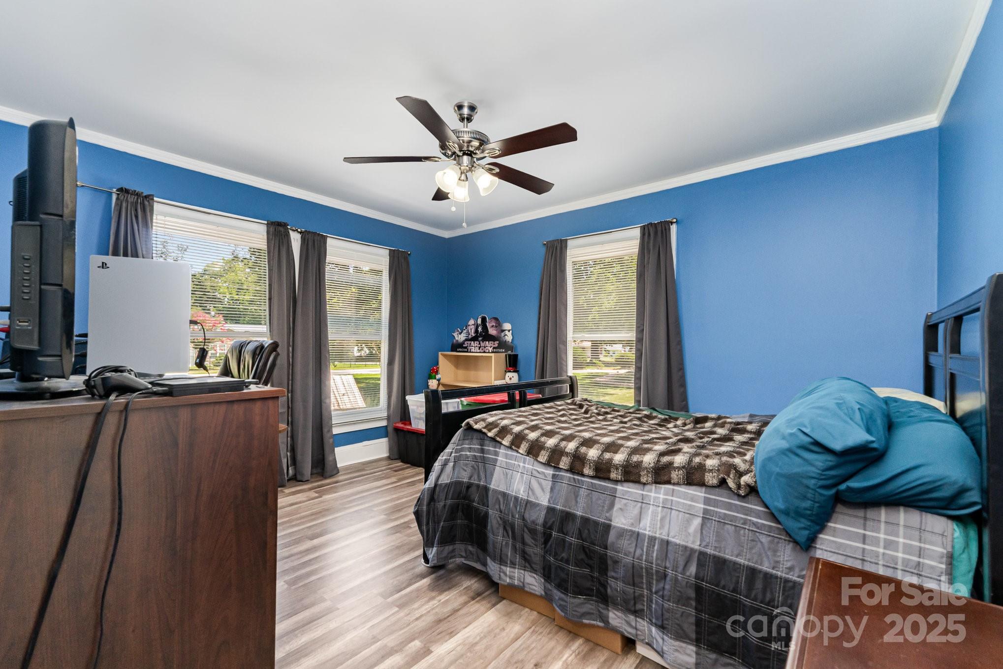 1306 Brantley Road Kannapolis, NC 28083 - Photo 14 of 29 a bedroom with a large bed and a large window