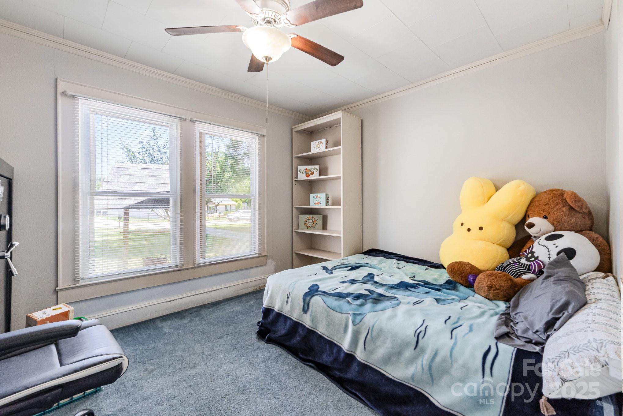1306 Brantley Road Kannapolis, NC 28083 - Photo 17 of 29 a bedroom with a bed and window