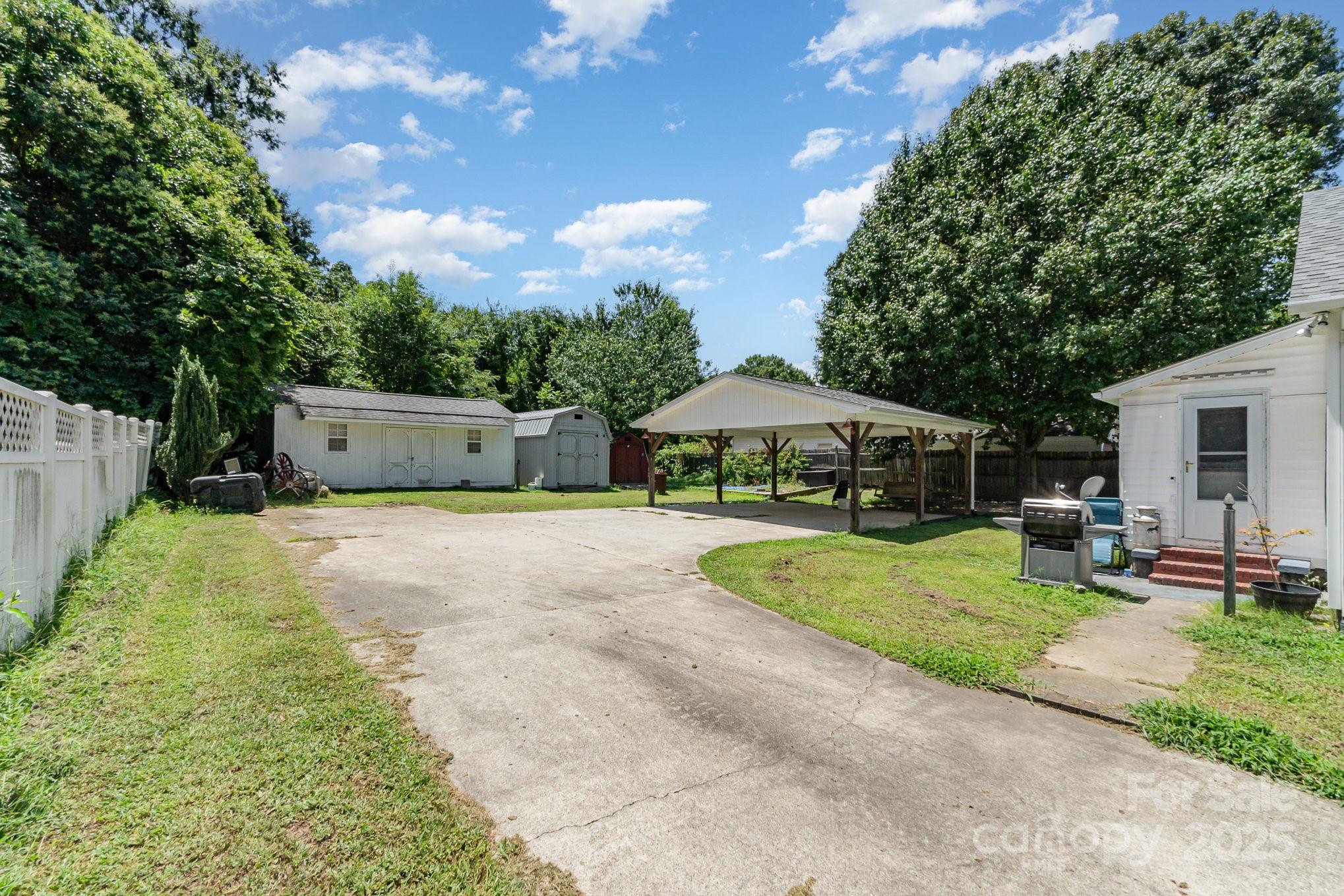 1306 Brantley Road Kannapolis, NC 28083 - Photo 29 of 29 a view of a house with backyard and sitting area