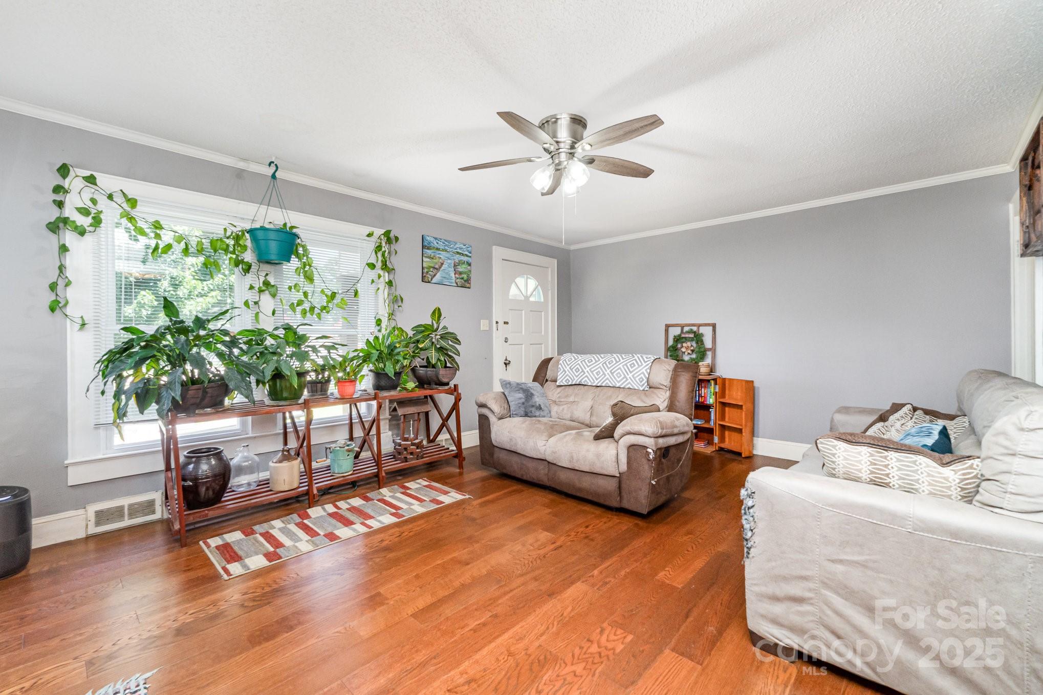 1306 Brantley Road Kannapolis, NC 28083 - Photo 7 of 29 a living room with furniture and a large window
