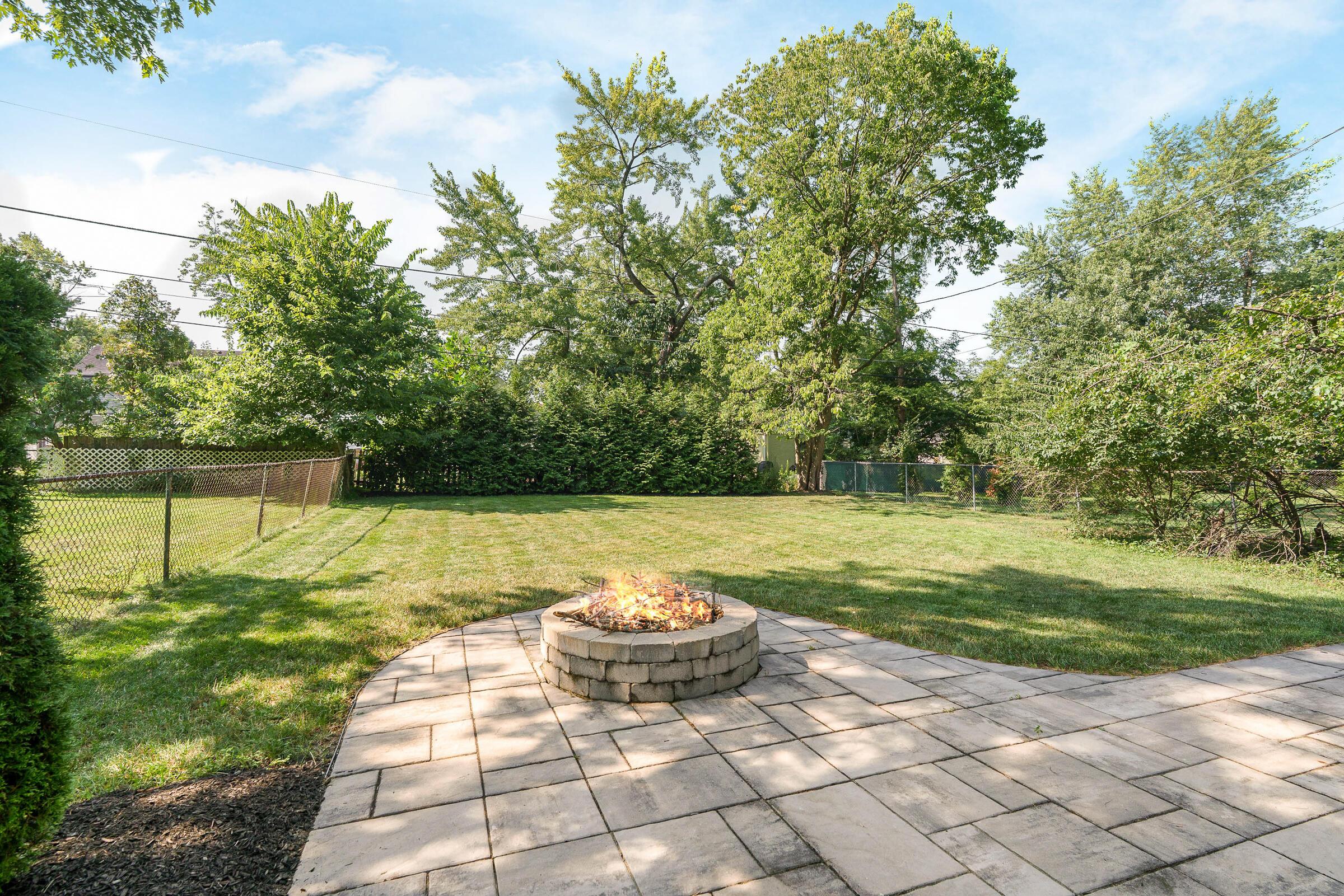 163 Garden Road Columbus, OH 43214 - Photo 37 of 46 The back patio & firepit overlook the large backyard