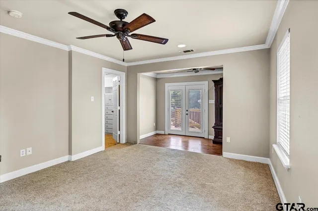 a view of livingroom with hardwood floor and a ceiling fan
