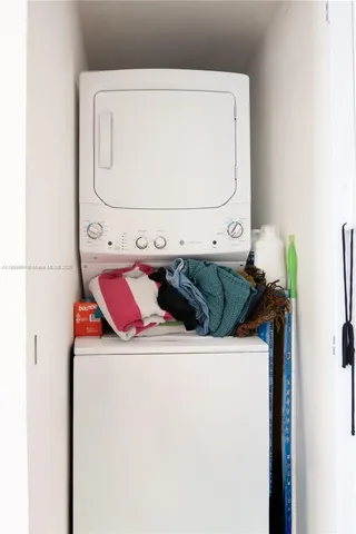 a utility room with washer and dryer