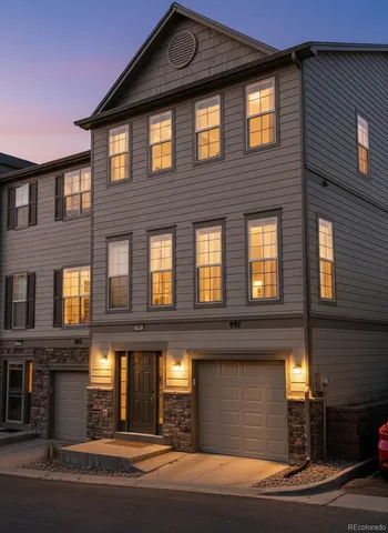 a dining room with furniture window and wooden floor