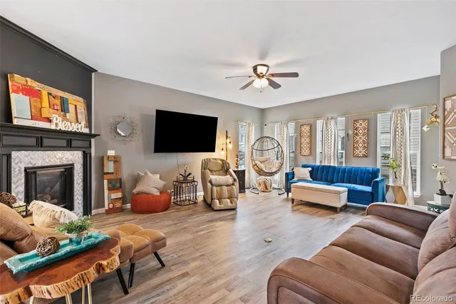 a bathroom with a sink a toilet a mirror a vanity and shower