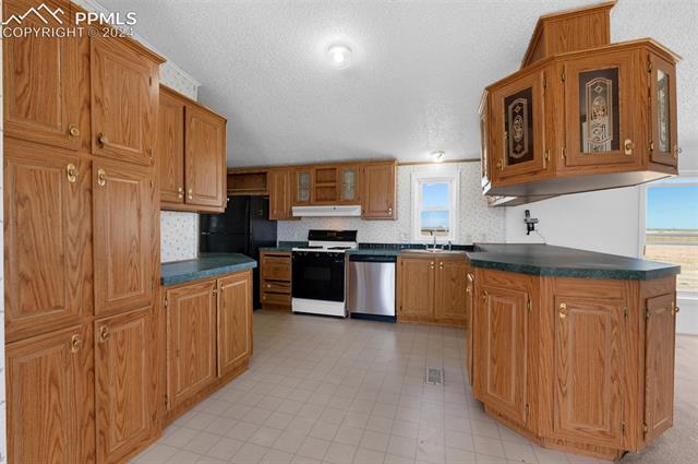 33510 Fossinger Road Yoder, CO 80864 - Photo 3 of 50 Kitchen seen from living room