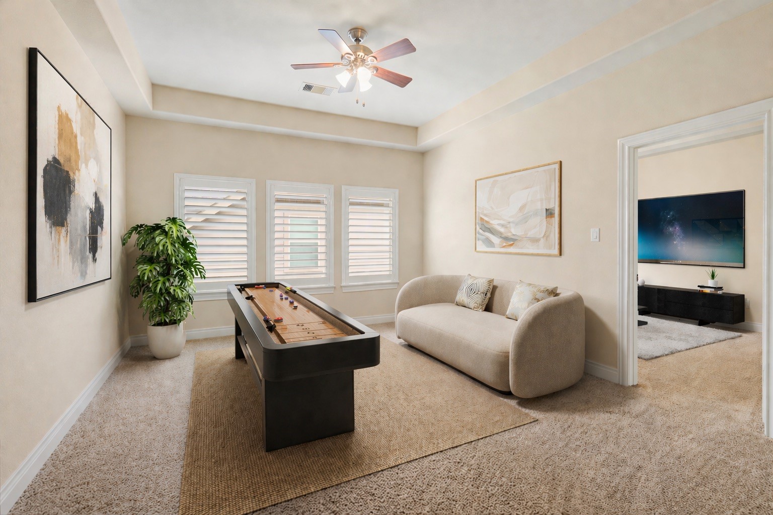 1607 Quail Ridge Drive Katy, TX 77493 - Photo 22 of 33 Upstairs you walk into a large family room that's perfect for game night or a lounging space! The large windows give you a beautiful view making it ideal for entertaining!