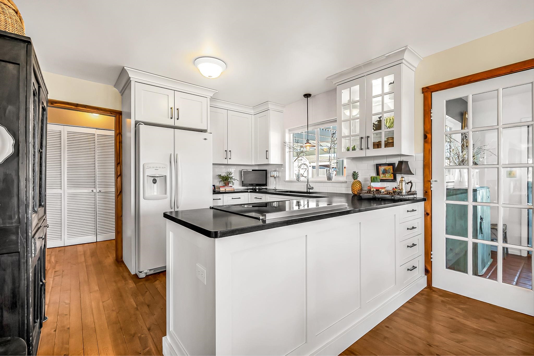 912 24 Road Grand Junction, CO 81505 - Photo 15 of 42 a kitchen with stainless steel appliances a stove a refrigerator and cabinets