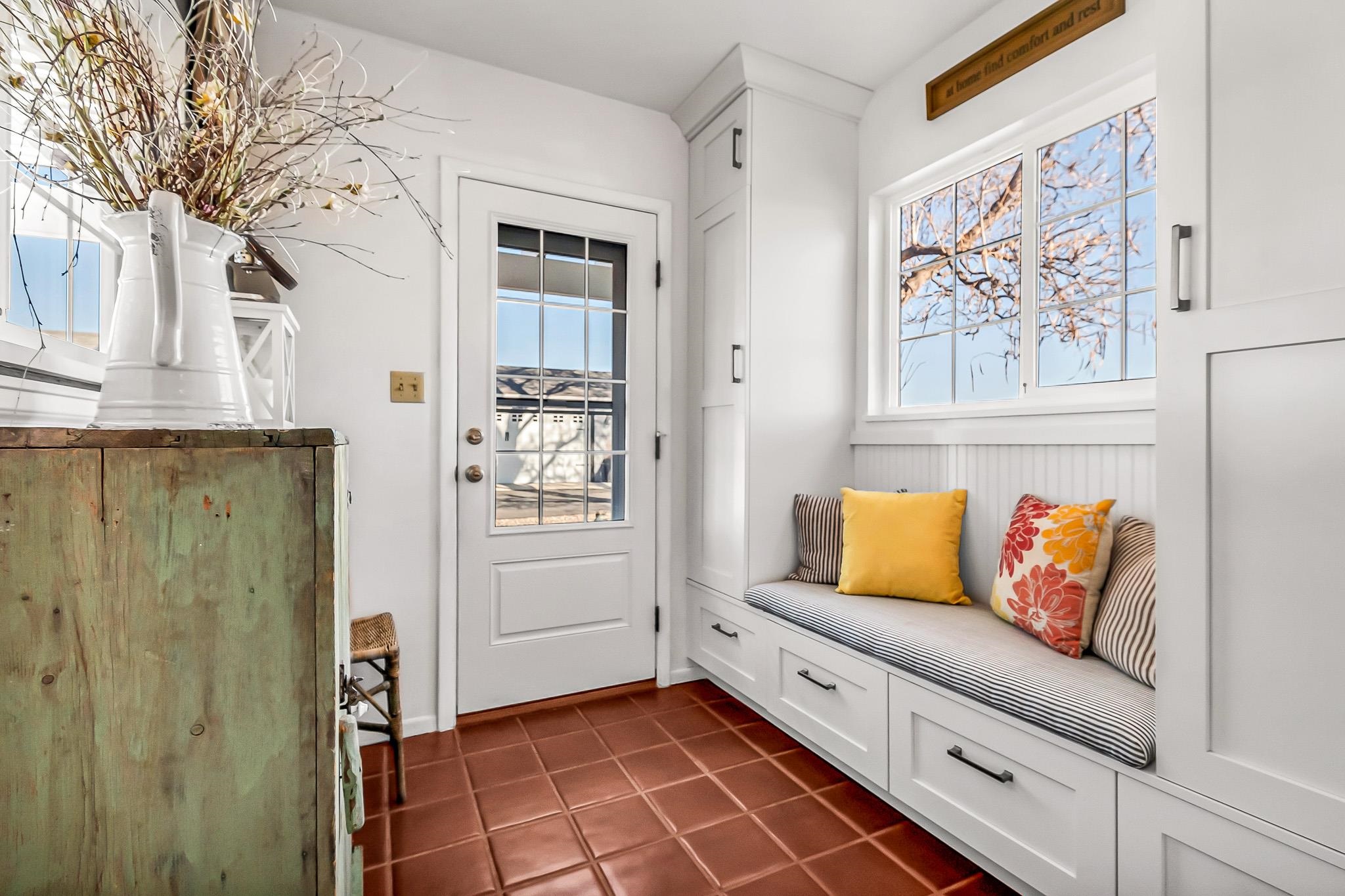 912 24 Road Grand Junction, CO 81505 - Photo 18 of 42 a living room with a couch and a painting on the wall