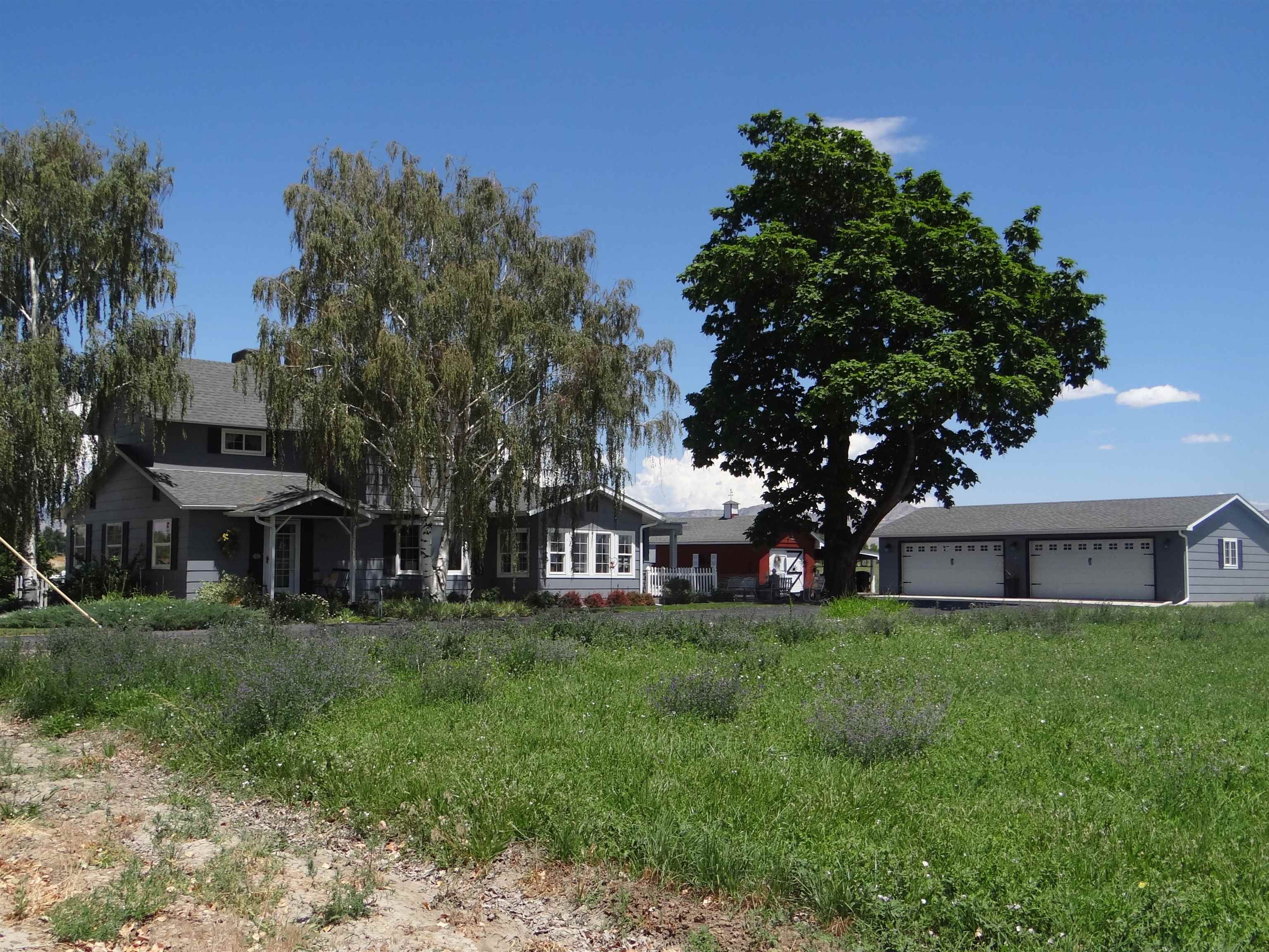 912 24 Road Grand Junction, CO 81505 - Photo 2 of 42 a view of a house with a yard