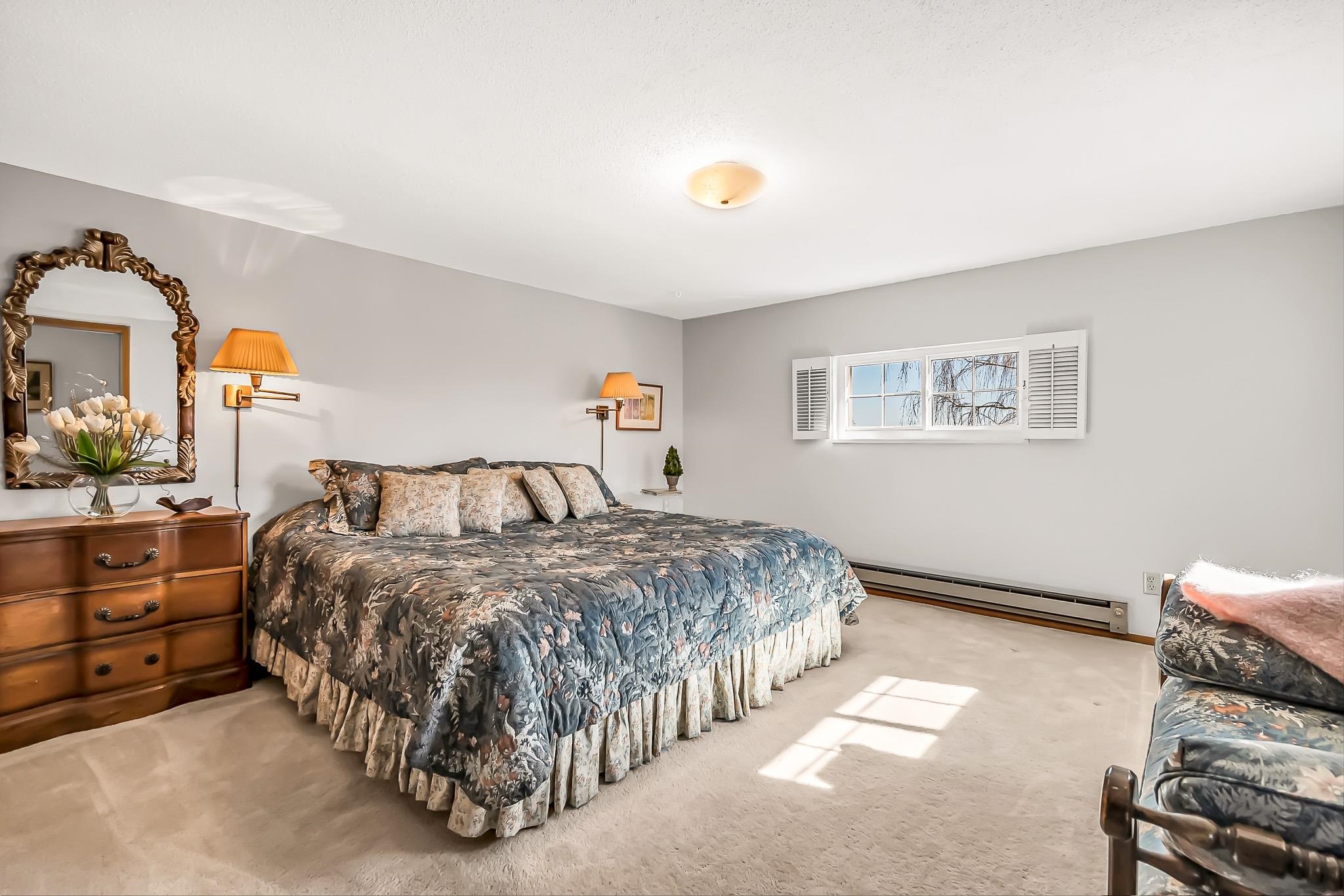 912 24 Road Grand Junction, CO 81505 - Photo 22 of 42 a bed room with a bed and two night stand