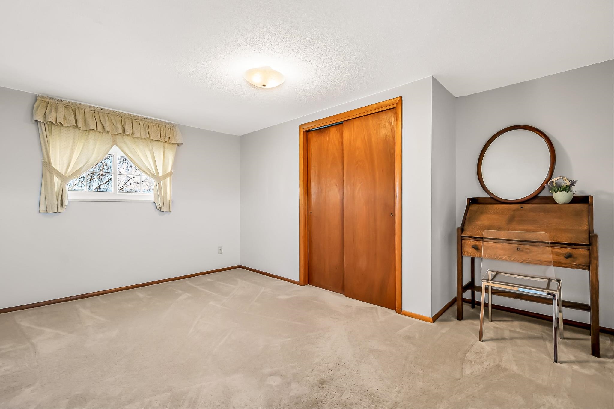 912 24 Road Grand Junction, CO 81505 - Photo 26 of 42 a view of room with wooden floor and furniture
