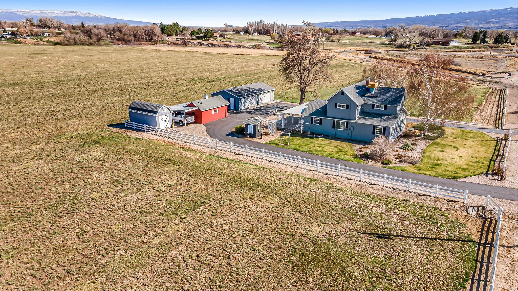 912 24 Road Grand Junction, CO 81505 - Photo 42 of 42 an aerial view of a house with a lake view