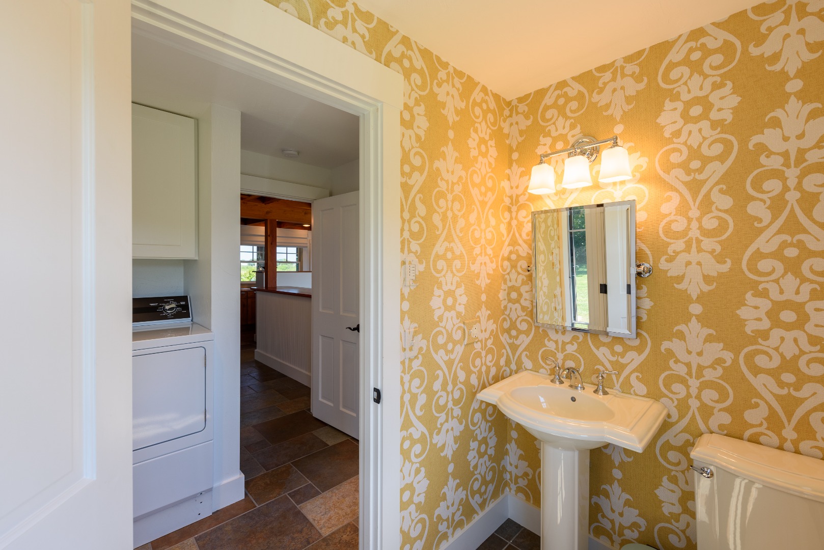 25 The Boulevard Edgartown, MA 02539 - Photo 16 of 40 a bathroom with a sink and mirror