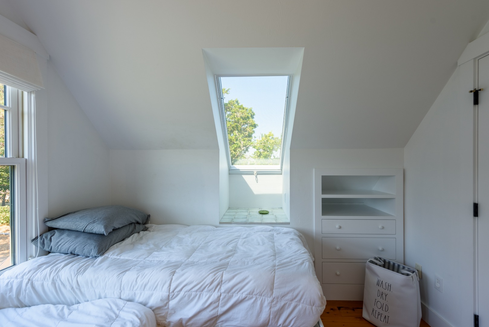 25 The Boulevard Edgartown, MA 02539 - Photo 22 of 40 a bedroom with a bed and a window
