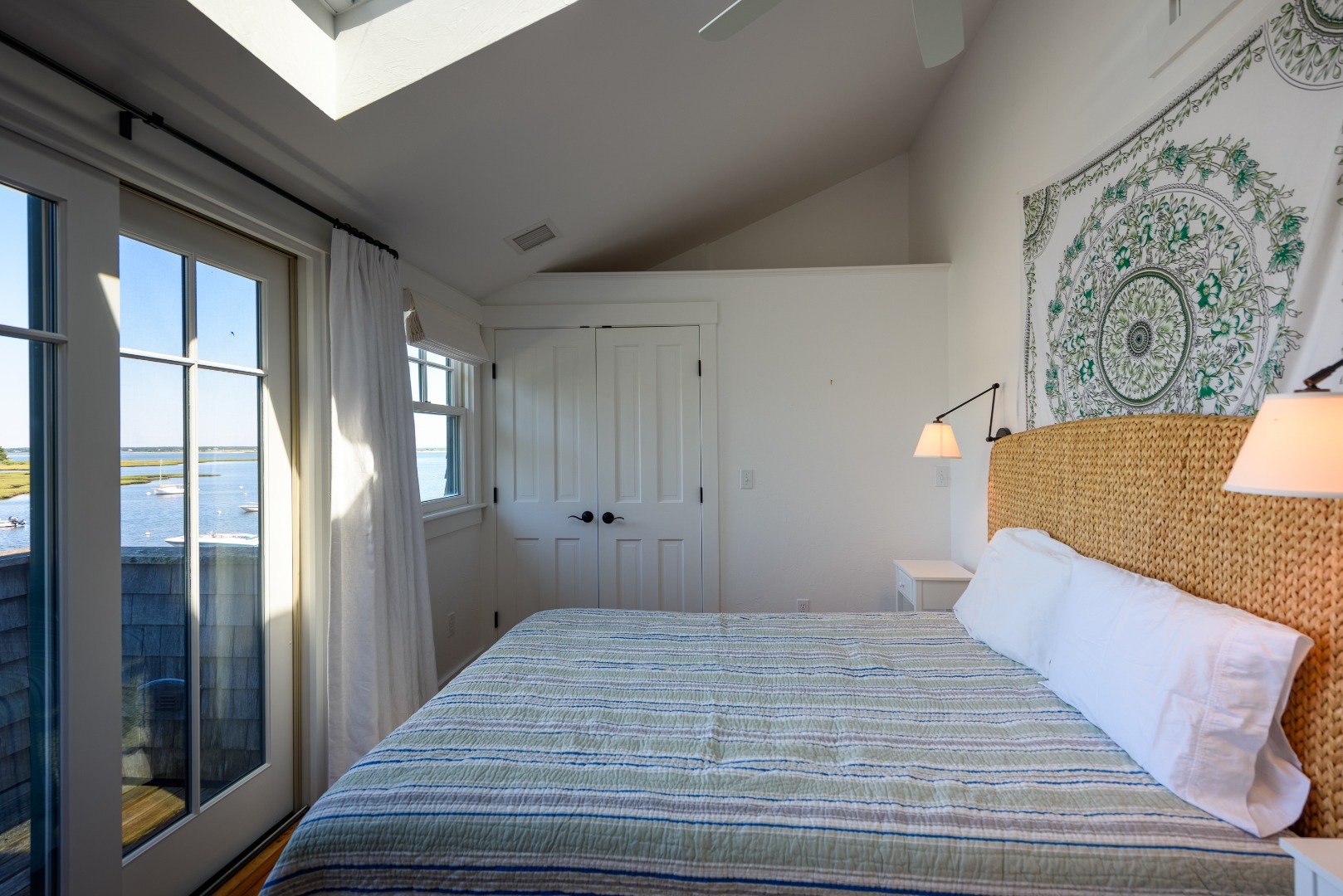 25 The Boulevard Edgartown, MA 02539 - Photo 24 of 40 a bedroom with a bed and a window