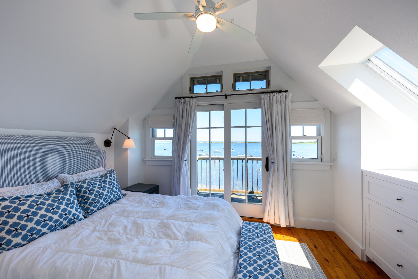 25 The Boulevard Edgartown, MA 02539 - Photo 27 of 40 a bedroom with a bed and a window