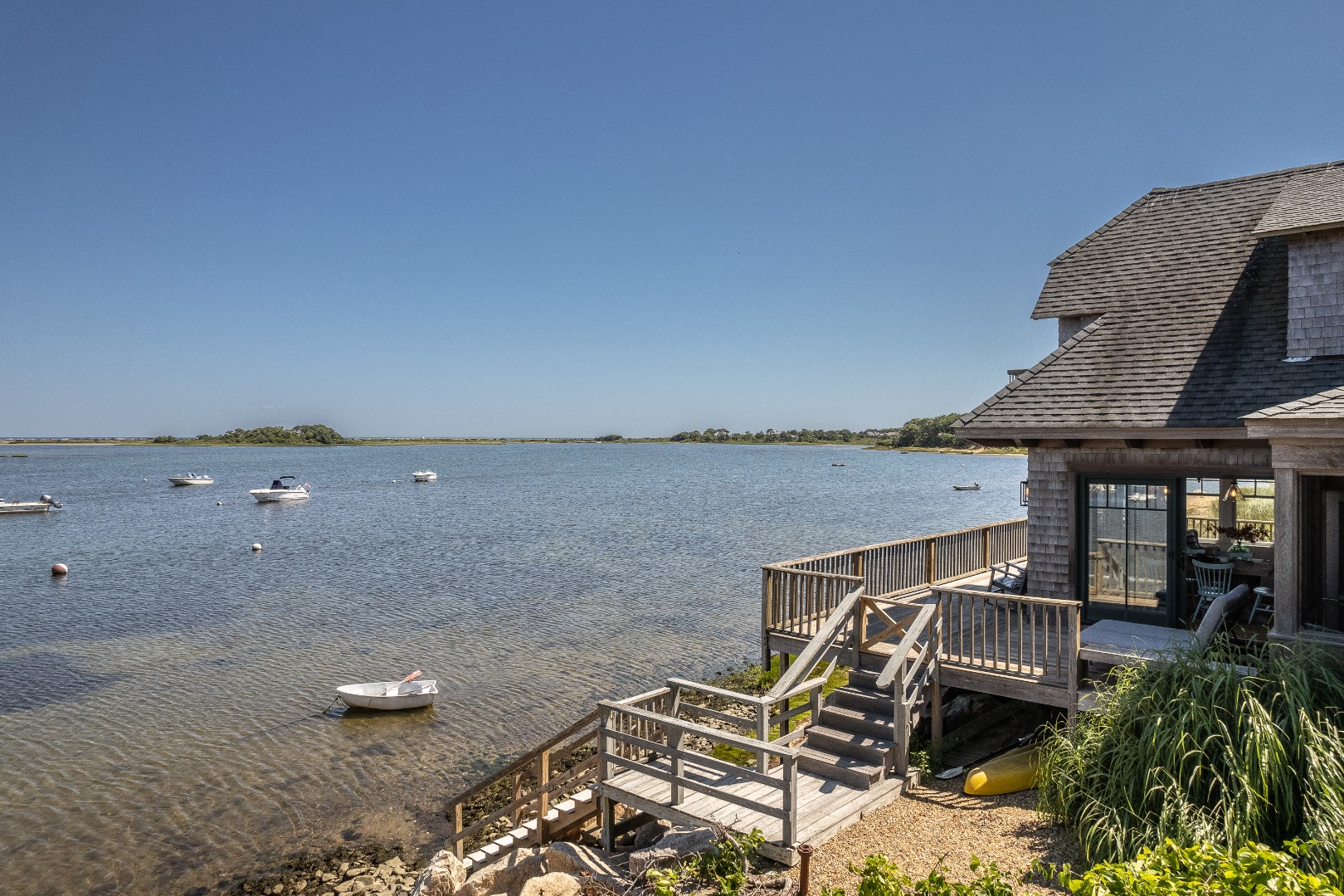 25 The Boulevard Edgartown, MA 02539 - Photo 35 of 40 an aerial view of a house with lake view and a floor to ceiling window