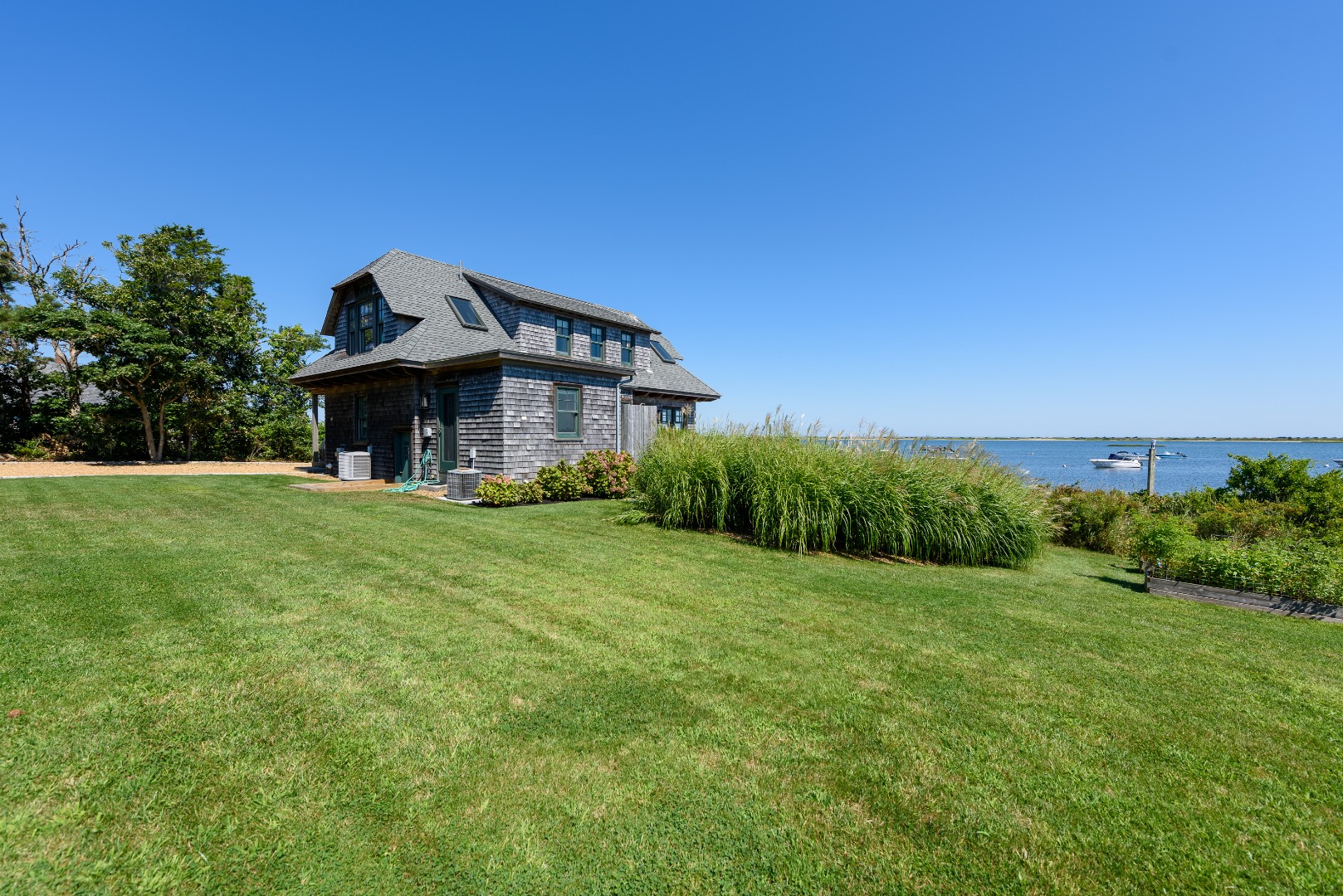 25 The Boulevard Edgartown, MA 02539 - Photo 37 of 40 a front view of a house with garden