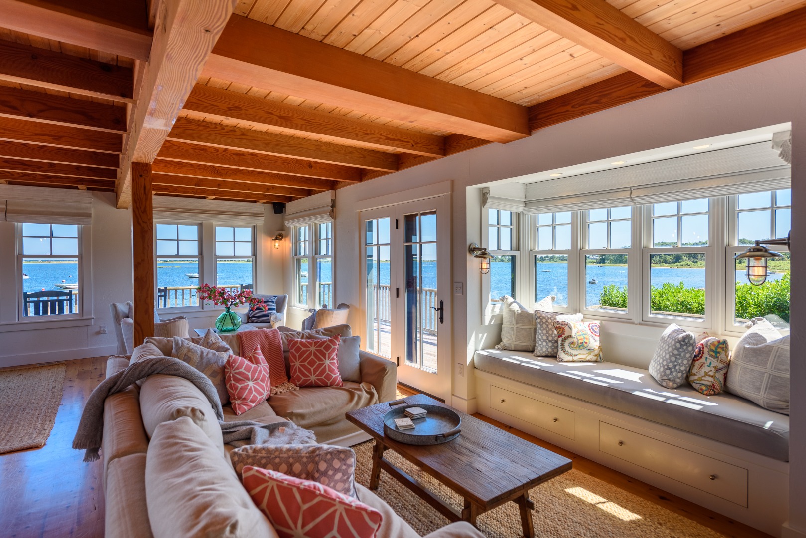 25 The Boulevard Edgartown, MA 02539 - Photo 7 of 40 a living room with furniture and floor to ceiling windows
