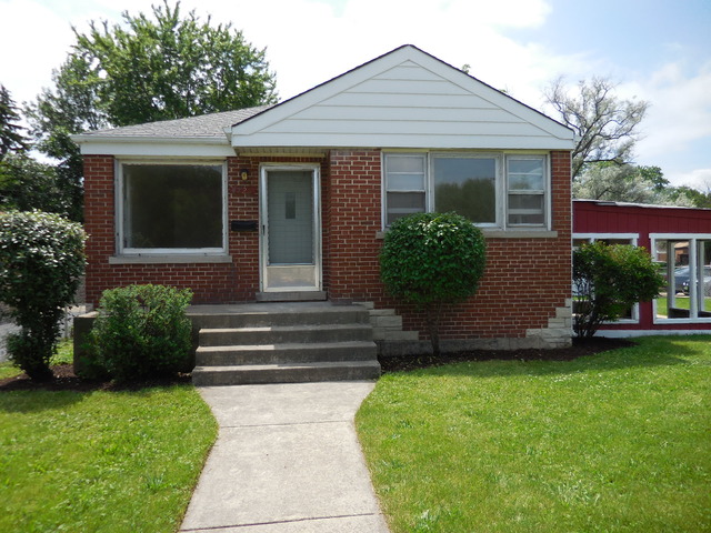 4723 Butterfield Road Hillside, IL 60162 - Photo 1 of 10 a front view of a house with a yard