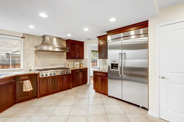 an aerial view of residential house with outdoor space
