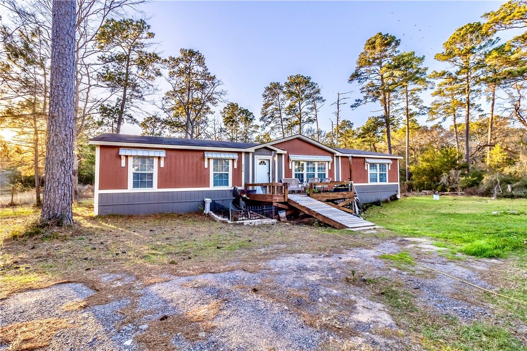 6258 North Hill Road Navasota, TX 77868 - Photo 2 of 30 front view of a house with a yard