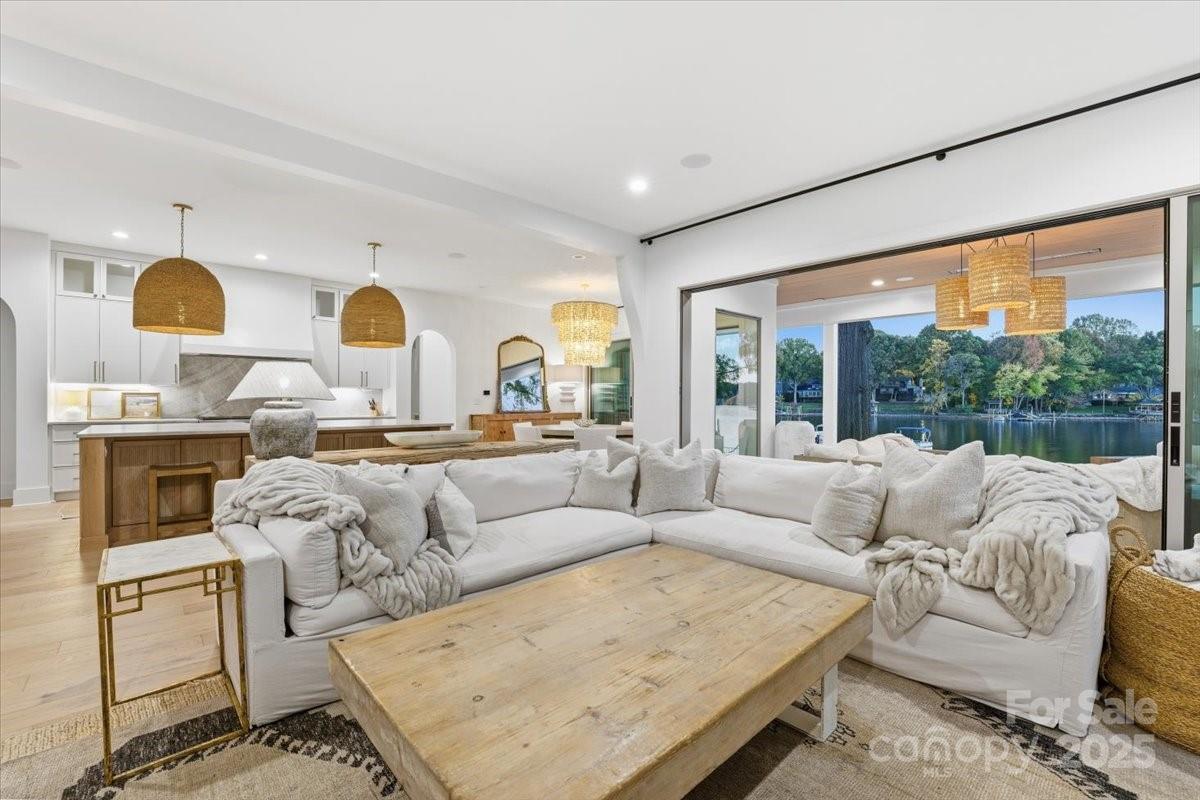 21520 Rio Oro Drive Cornelius, NC 28031 - Photo 11 of 43 a living room with furniture and a large window