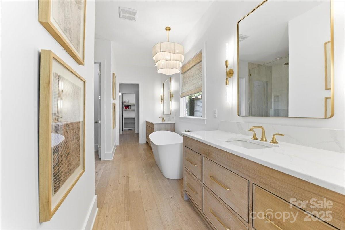 21520 Rio Oro Drive Cornelius, NC 28031 - Photo 19 of 43 a bathroom with a sink and a mirror