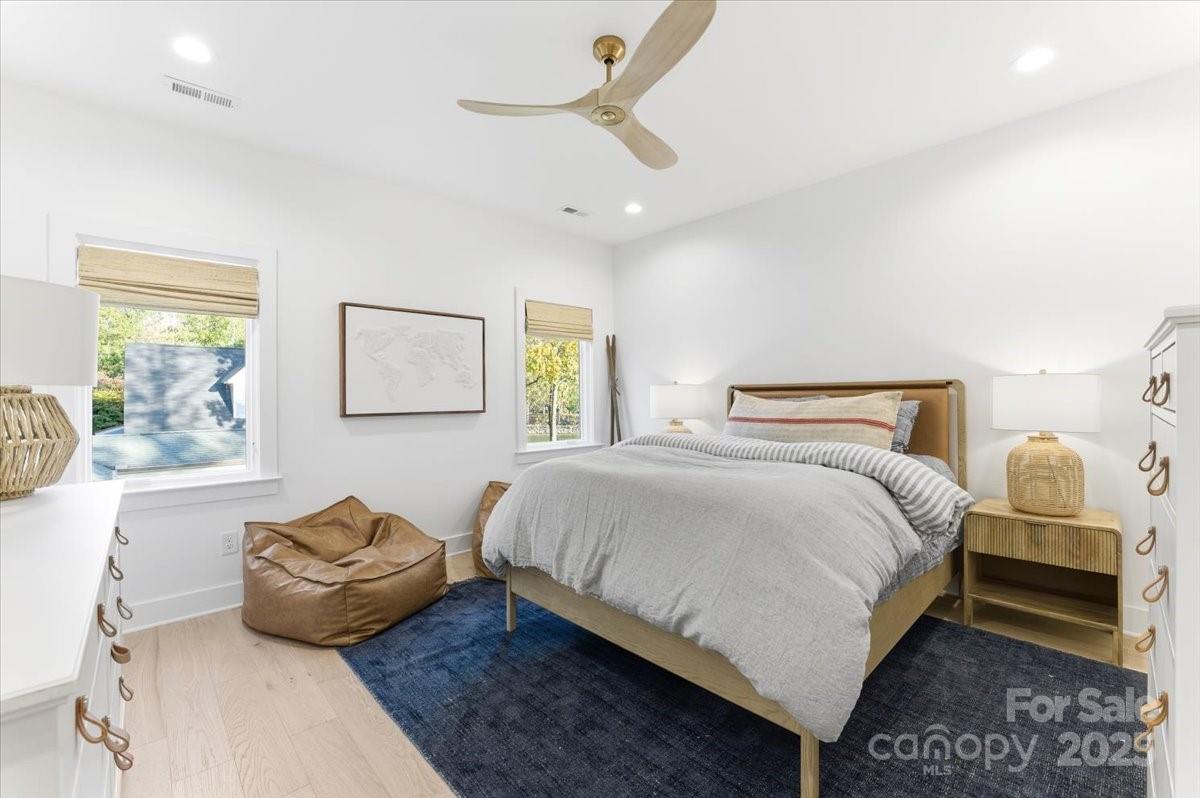 21520 Rio Oro Drive Cornelius, NC 28031 - Photo 30 of 43 a bedroom with a bed and window