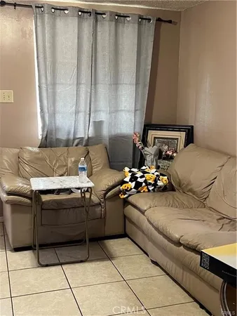 a living room with a couch and a table