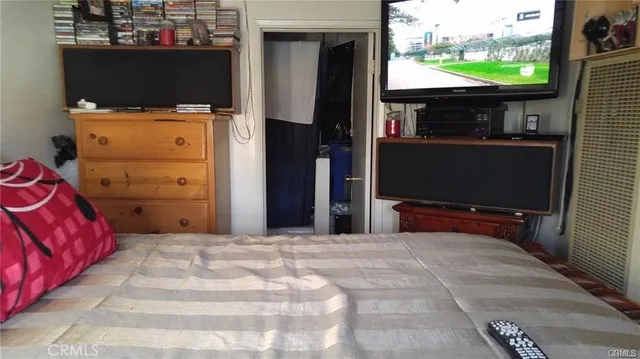 a view of a room with a flat screen tv
