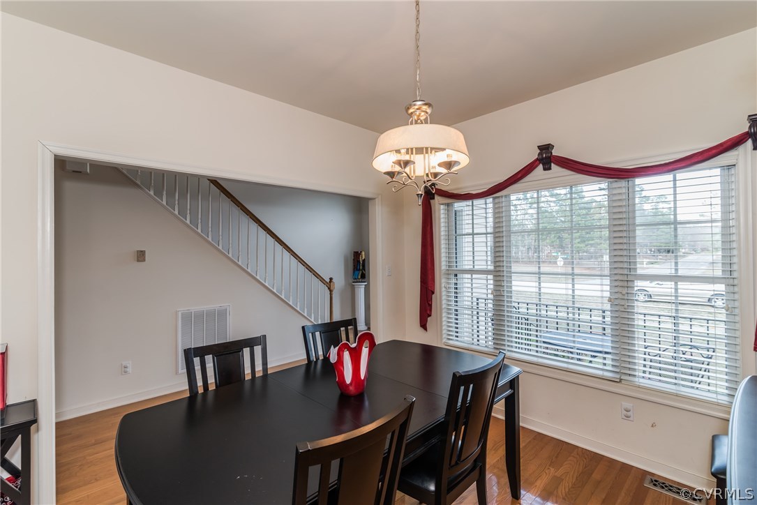 15842 Sandwave Road Chester, VA 23831 - Photo 15 of 40 Formal dining off of foyer entrance - hardwood flo
