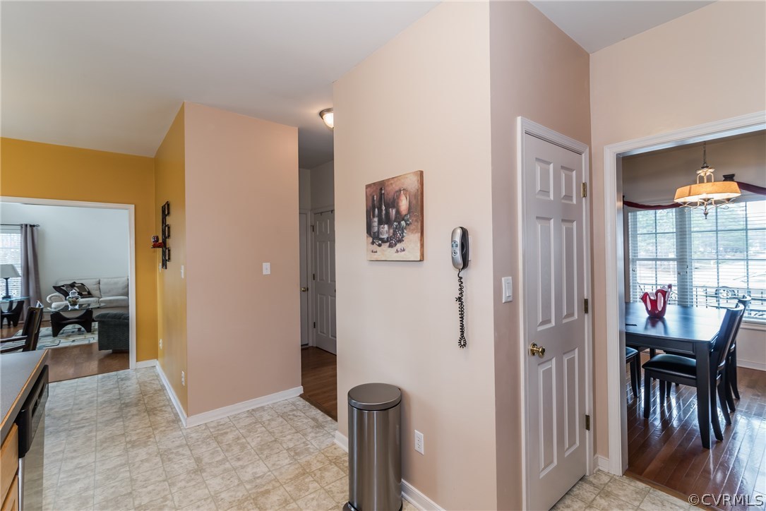 15842 Sandwave Road Chester, VA 23831 - Photo 17 of 40 Entryway to kitchen from dining and pantry access