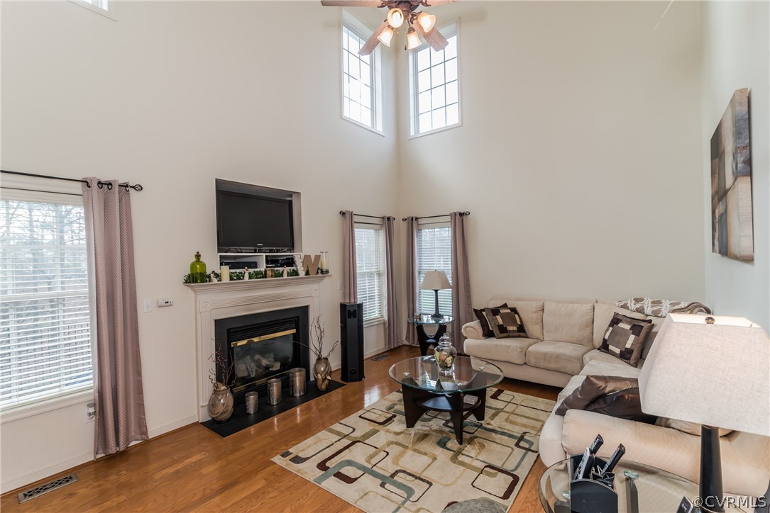 15842 Sandwave Road Chester, VA 23831 - Photo 22 of 40 Open family room with natural light, gas fireplace