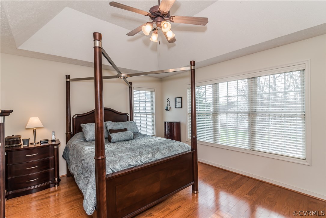 15842 Sandwave Road Chester, VA 23831 - Photo 27 of 40 Master bedroom with lots of light, fan, hardwood f