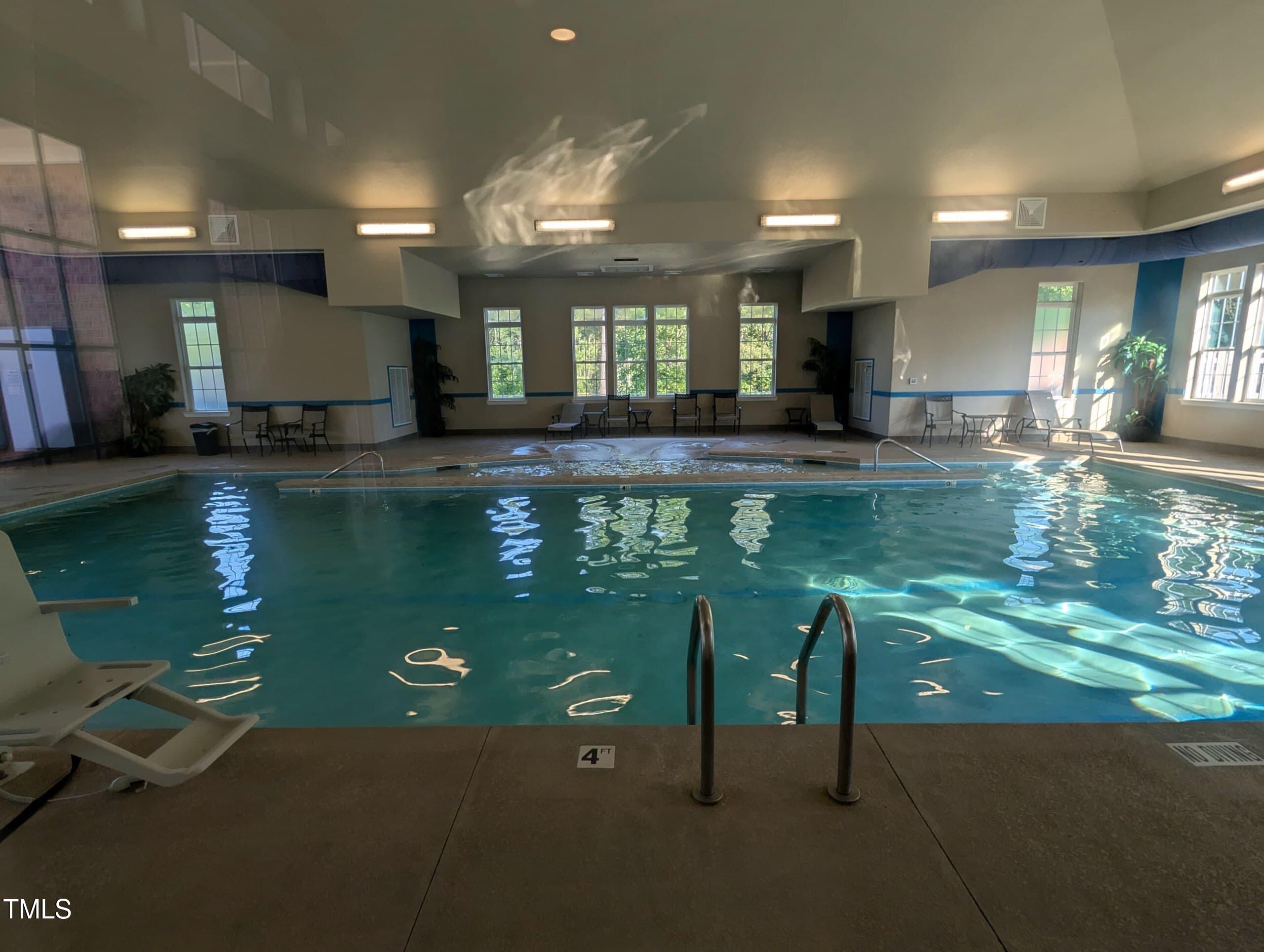 3300 Star Gazing Lane Durham, NC 27703 - Photo 28 of 31 a view of kitchen with dining table and chairs