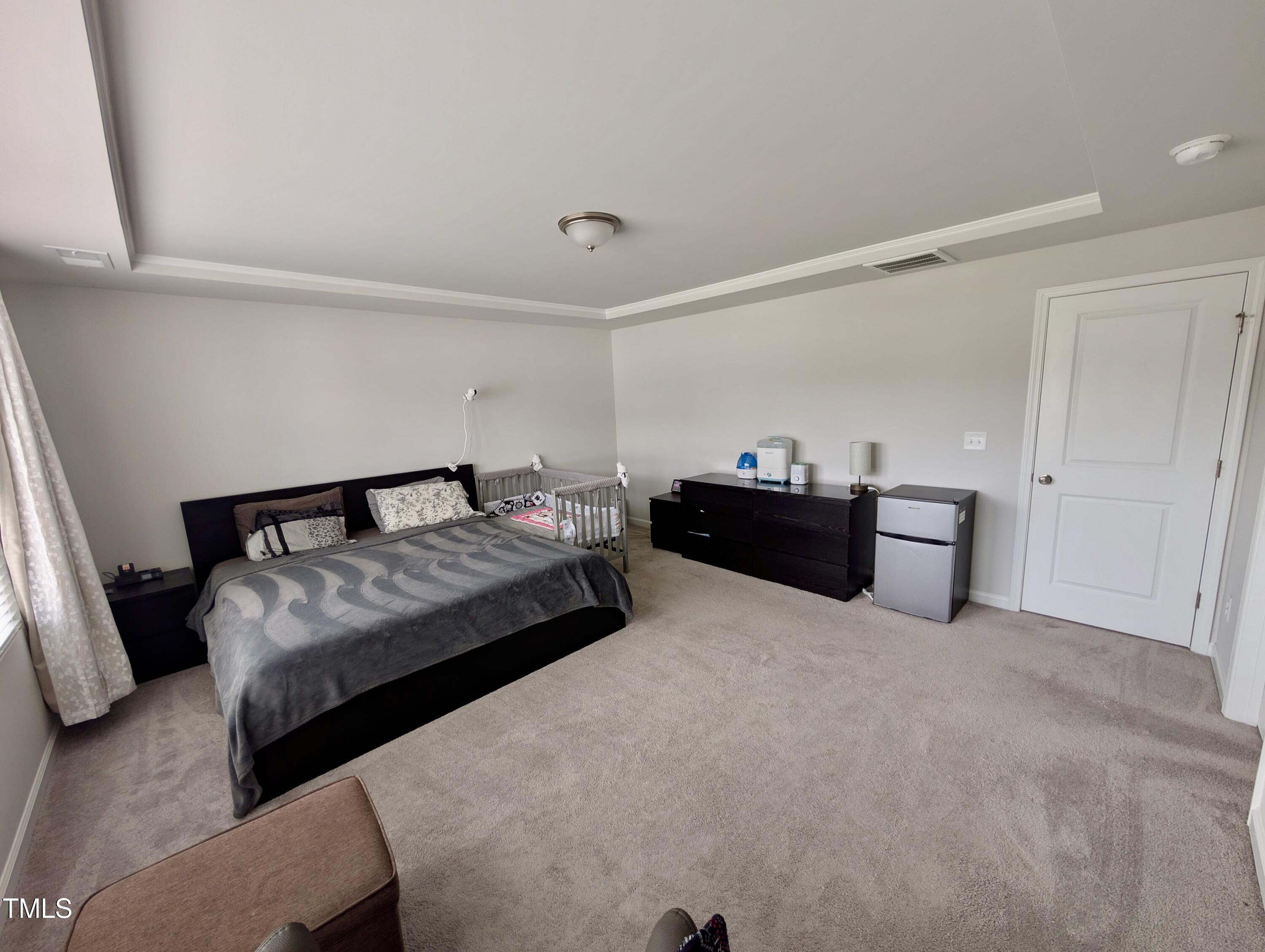 3300 Star Gazing Lane Durham, NC 27703 - Photo 7 of 31 a bedroom with a bed and dresser