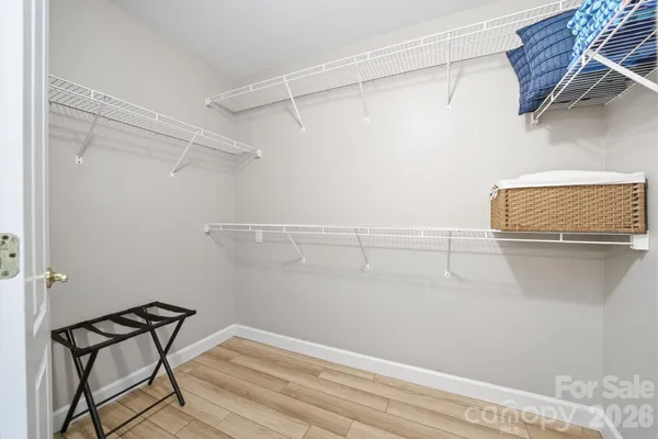 a view of a room with racks on the wall