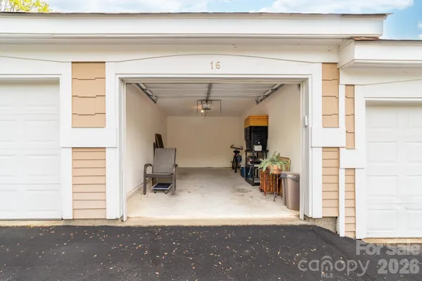 a view of a livingroom with furniture and a window